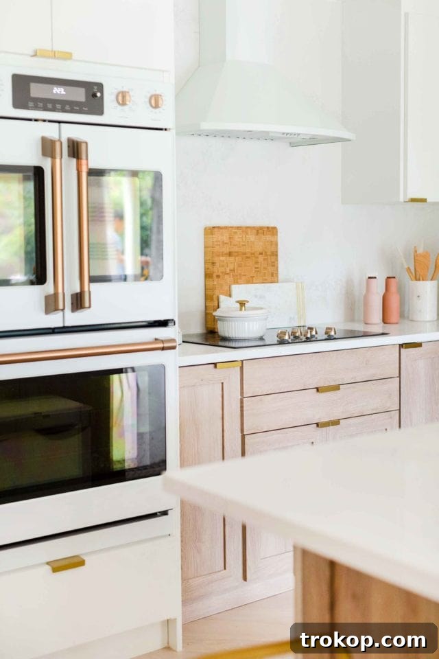 Cedar & Moss sconce lights above kitchen wet bar
