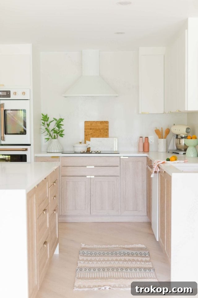 Overall view of kitchen showcasing lighting and open shelves