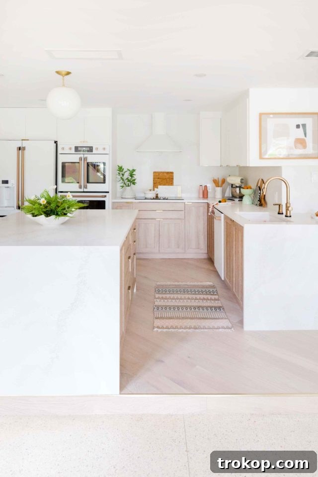 Chic kitchen with integrated GE Cafe appliances