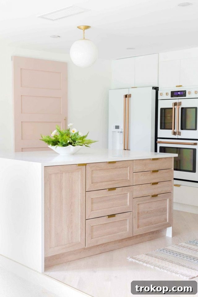 Bright and airy renovated kitchen with wood flooring