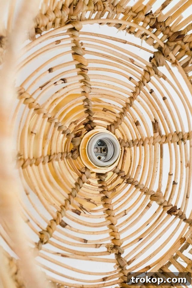 Woven Basket Pendant Light 10 The woven basket is now securely attached to the light fixture on the ceiling, held by the shade ring.