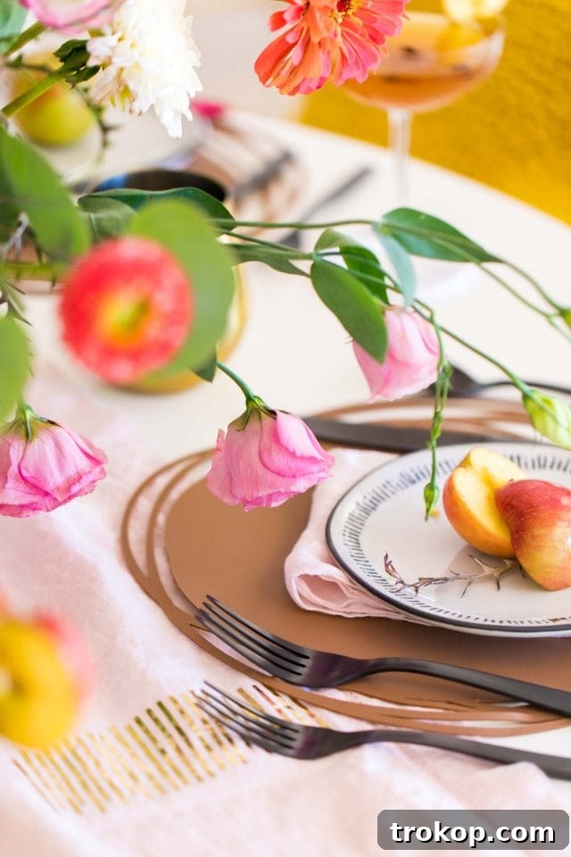 close up picture of fall table decor flowers by sugar and cloth