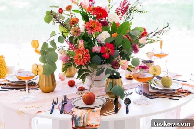a horizontal photo of the completed fall dining table by sugar and cloth
