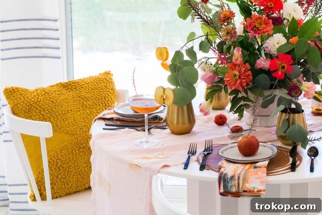 Create a Custom Iron-On Table Runner 6 Horizontal photo showcasing a finished DIY table runner as part of a styled fall table decor setting.