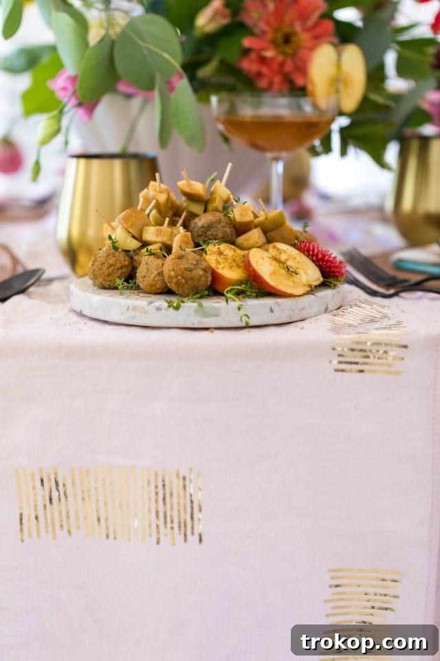 Create a Custom Iron-On Table Runner 7 Close-up photograph of the edge of a dining table, highlighting the elegant gold details of the DIY table runner.