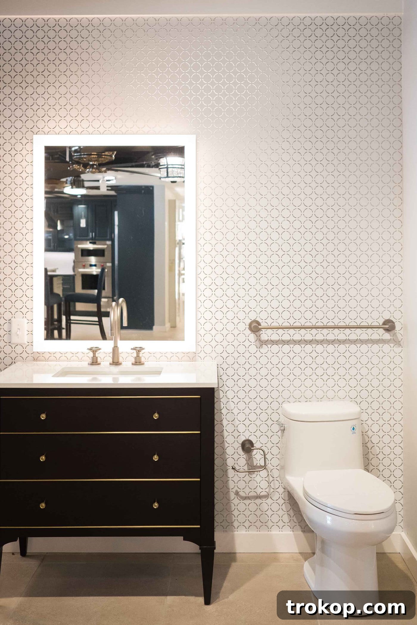 Photo of a mock bathroom vanity design at Ferguson Showroom, showcasing modern fixtures, a marble countertop, and elegant lighting for design inspiration.