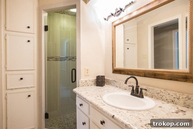 Lakeside Guest Bathroom Makeover: Design Ideas and Pre-Renovation Photos 4 Horizontal before photo of our guest bathroom, highlighting the original 70s decor