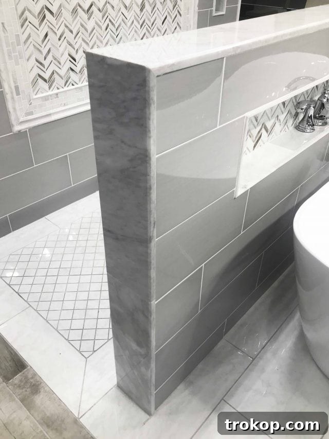 Lakeside Guest Bathroom Makeover: Design Ideas and Pre-Renovation Photos 5 Photo of an example shower wall installation at The Tile Shop, inspiring our design