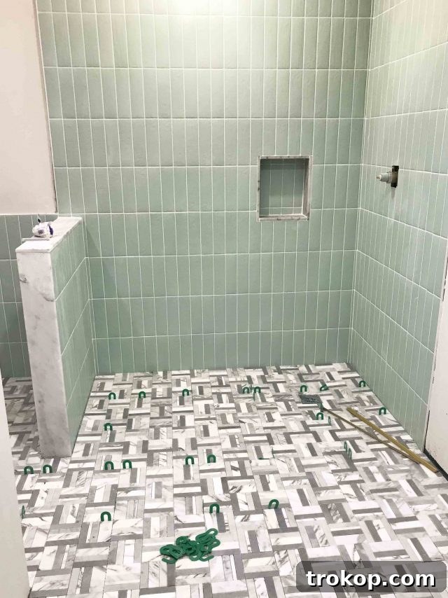 Lakeside Guest Bathroom Makeover: Design Ideas and Pre-Renovation Photos 7 Photo of our finished tile installation by Sugar & Cloth, ready for final touches