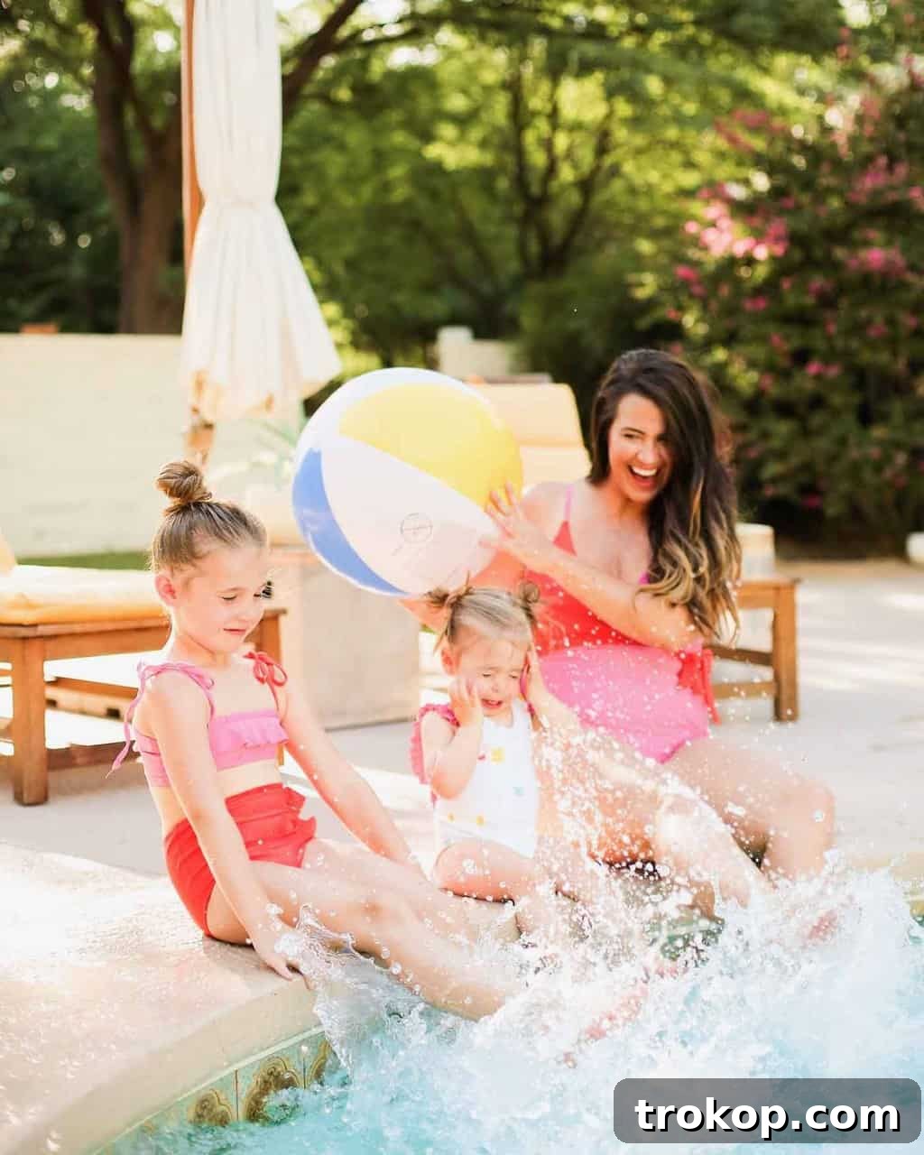 Olivia Ocean: Real Moms Make Waves in Mommy and Me Swimsuits 12 Lexy and her daughters Vita and Mara in matching color block and confetti swimsuits