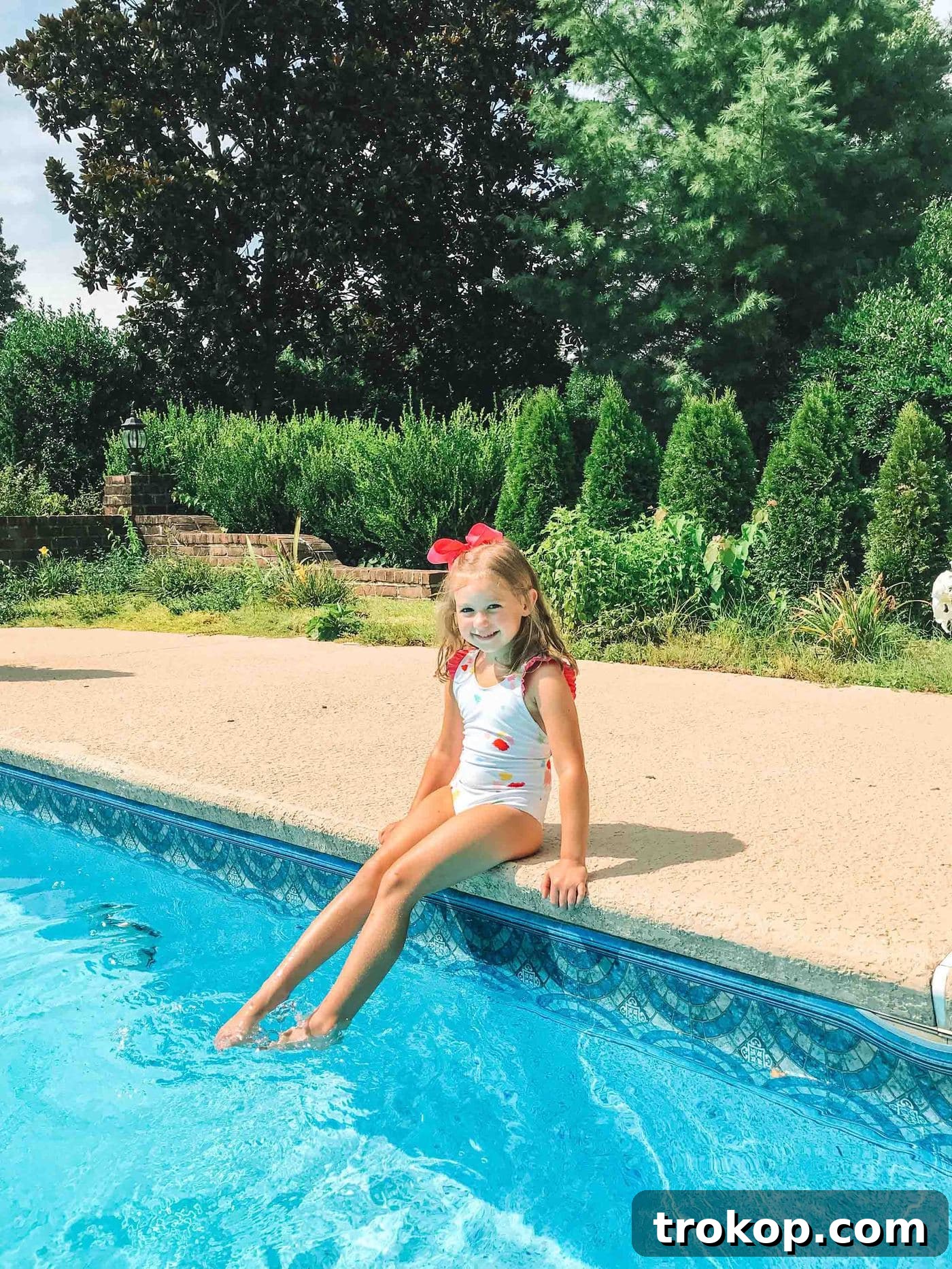 Blakely in the Laguna confetti one piece swimsuit