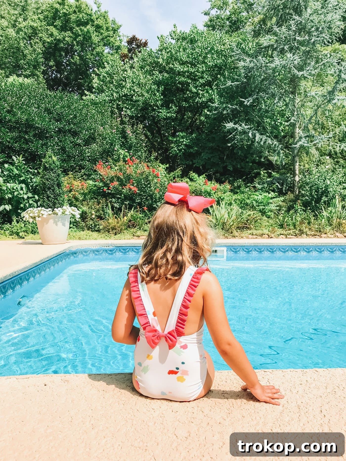 Blakely in the Laguna confetti one piece swimsuit