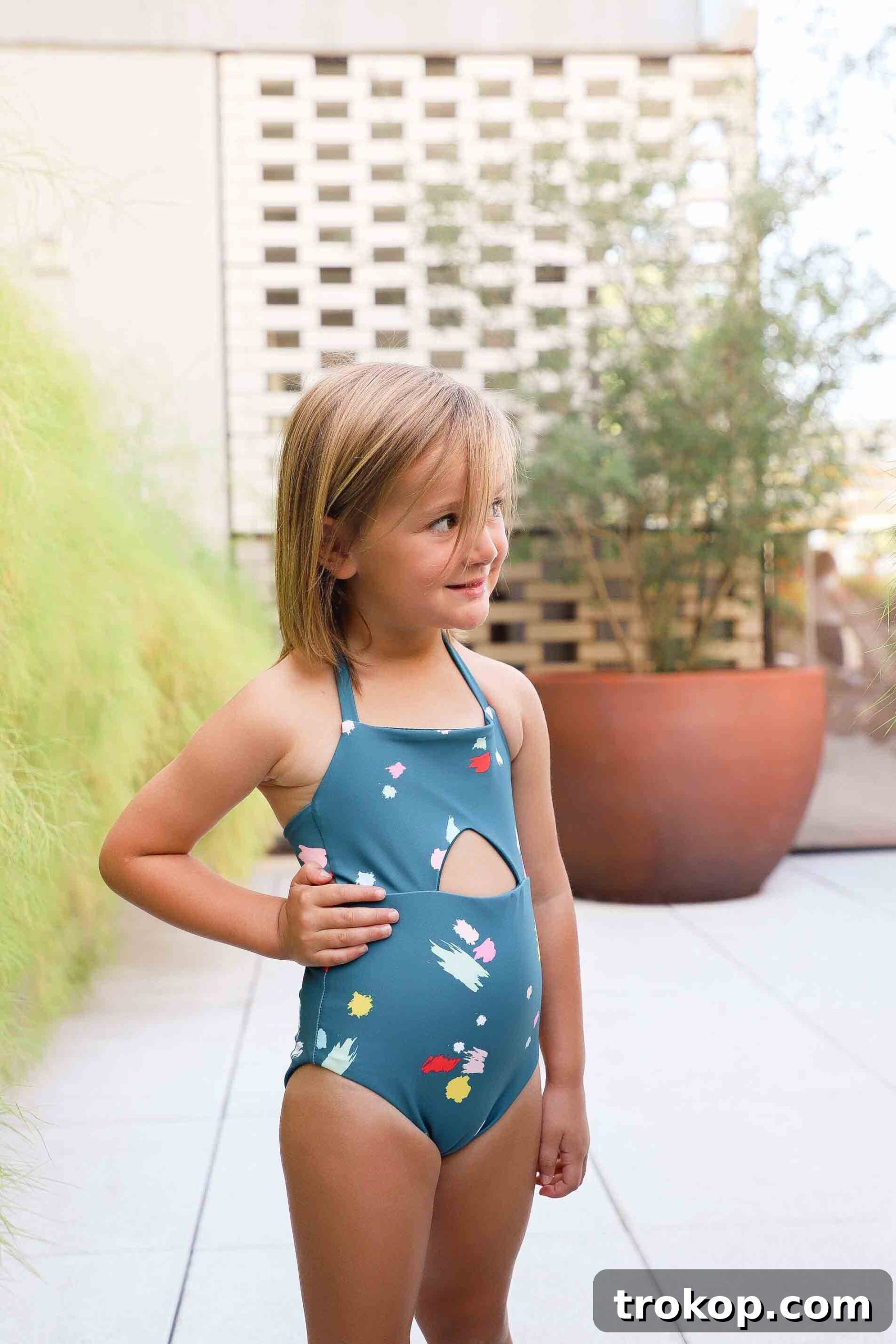 Olivia and friends in Malibu confetti one-pieces by The Ombre Gang