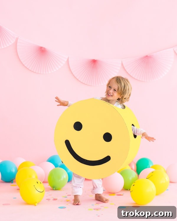 Child in a cheerful DIY Smiley Face Halloween costume
