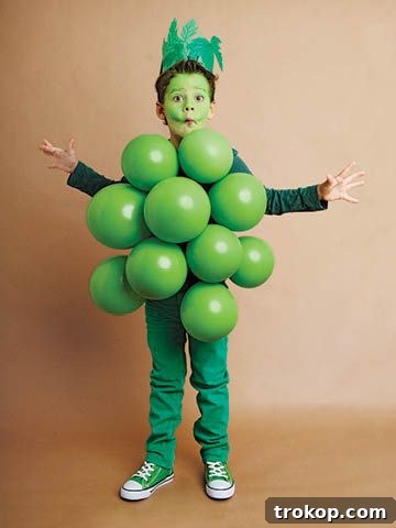 Children in fun DIY Grape Vine Halloween costumes made with balloons