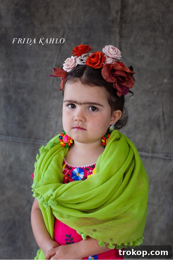 Girl dressed as iconic artist Frida Kahlo for a DIY Halloween costume