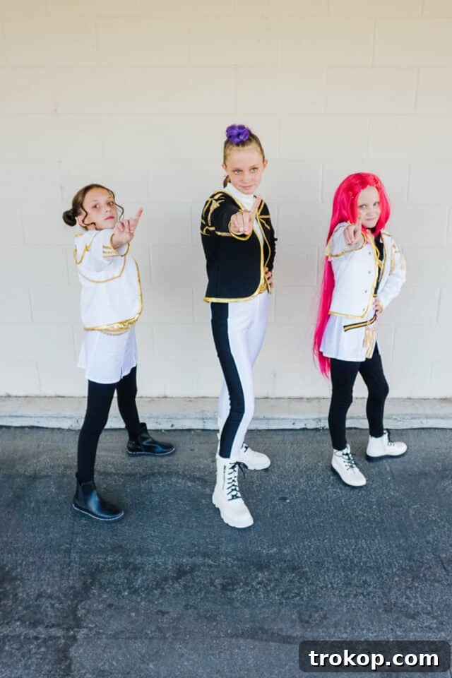 Kids dressed in a stylish KPop Demon Hunters Huntrix DIY Halloween costume