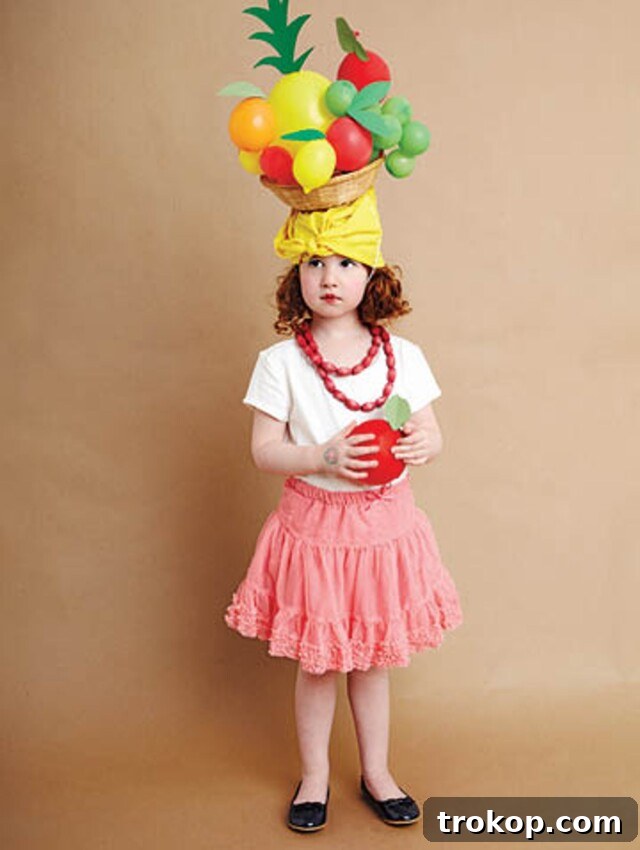 Child in a vibrant Carmen Miranda DIY Halloween costume with fruit balloons on her head