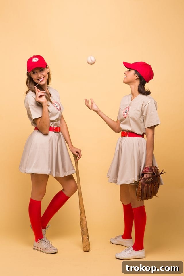 41 Handmade Halloween Costumes for Dynamic Duos 18 Two women dressed as baseball players from A League of Their Own (Rockford Peaches) for a DIY couples costume.
