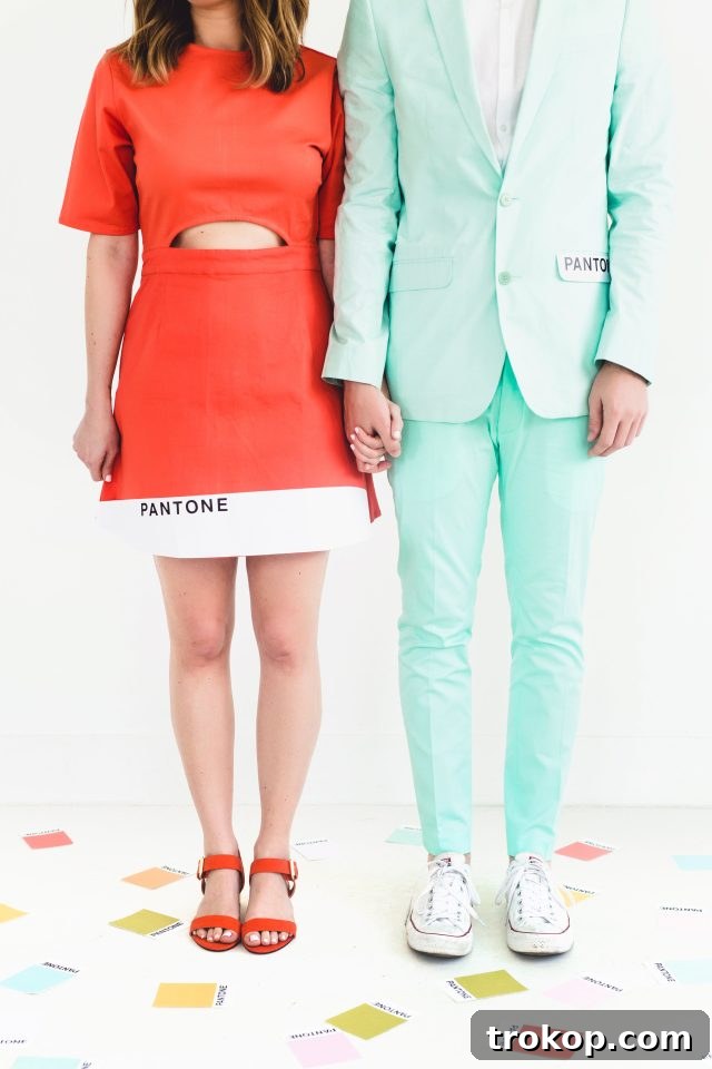 41 Handmade Halloween Costumes for Dynamic Duos 3 Pantone Couples Halloween Costume Idea by Ashley Rose of Sugar & Cloth, featuring two people dressed as vibrant Pantone color cards.
