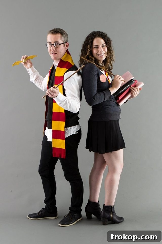 41 Handmade Halloween Costumes for Dynamic Duos 30 Man and woman dressed as Harry Potter and Hermione Granger for a magical DIY couples costume.