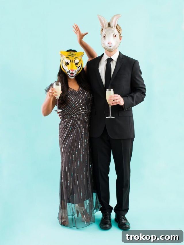 41 Handmade Halloween Costumes for Dynamic Duos 9 Man and woman dressed as 'party animals' for a funny DIY couples costume.