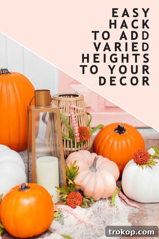 Whimsical Halloween Door Decorating Ideas 6 Visual tip on photo illustrating how to add varying heights to Halloween door decor for visual impact