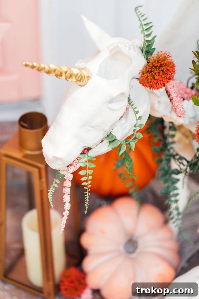 Whimsical Halloween Door Decorating Ideas 7 Close-up of a glamorous gold unicorn skeleton outdoor Halloween decoration