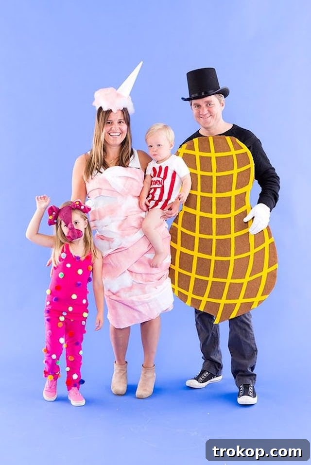 40 Spooktacular Family Halloween Costume Ideas 11 A family dressed in creative circus snack themed Halloween costumes, including popcorn, cotton candy, and hot dogs.