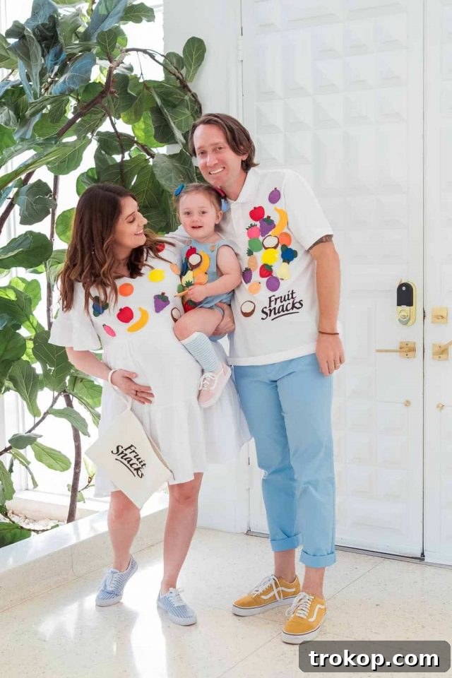 40 Spooktacular Family Halloween Costume Ideas 41 A family dressed in colorful and playful DIY fruit snacks food costumes for Halloween.