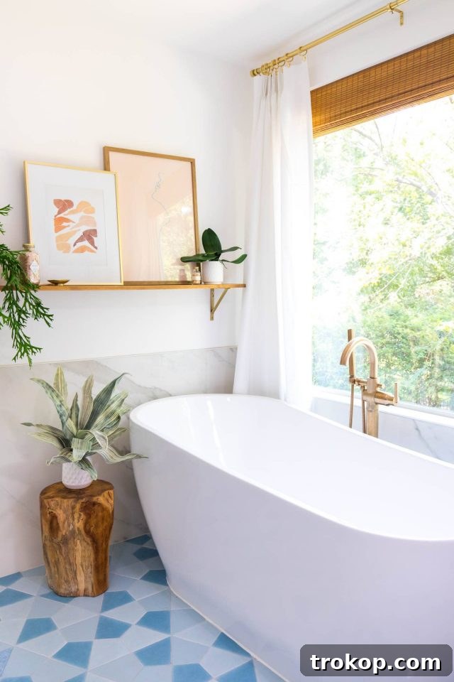 photo of a bathtub and wall ledge in master bathroom remodel