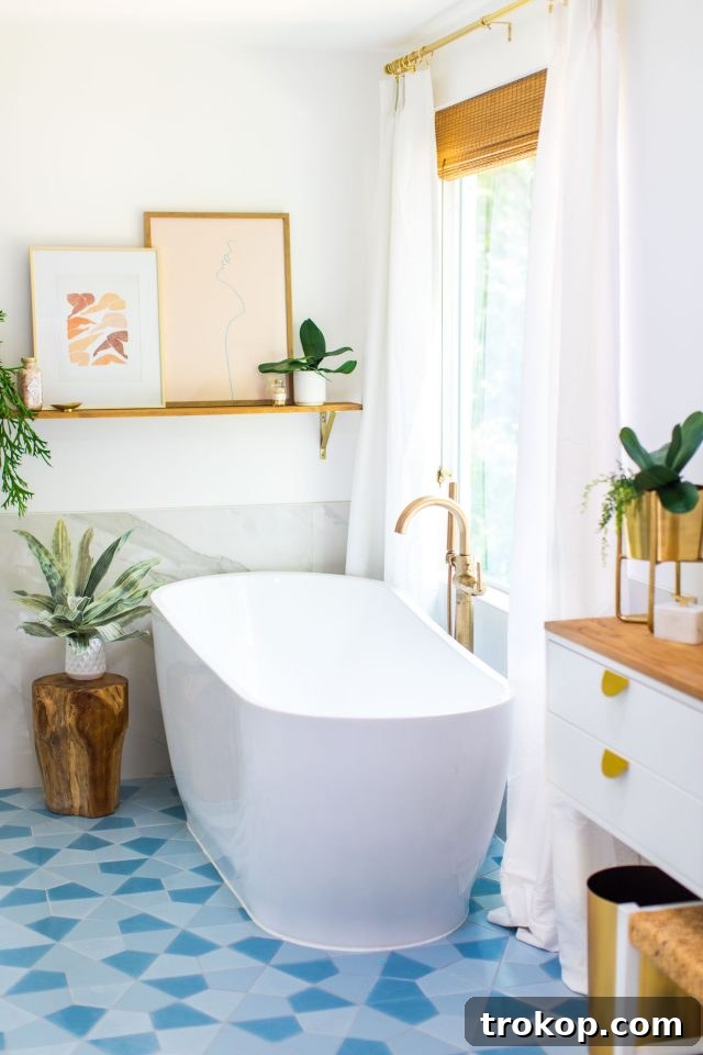 photo of a floating bathtub with statement floor tile 