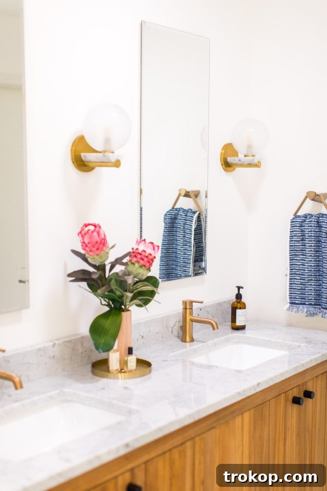 Lakeside Bathroom Reimagined: A Stunning Makeover 5 photo of flowers on bathroom vanity