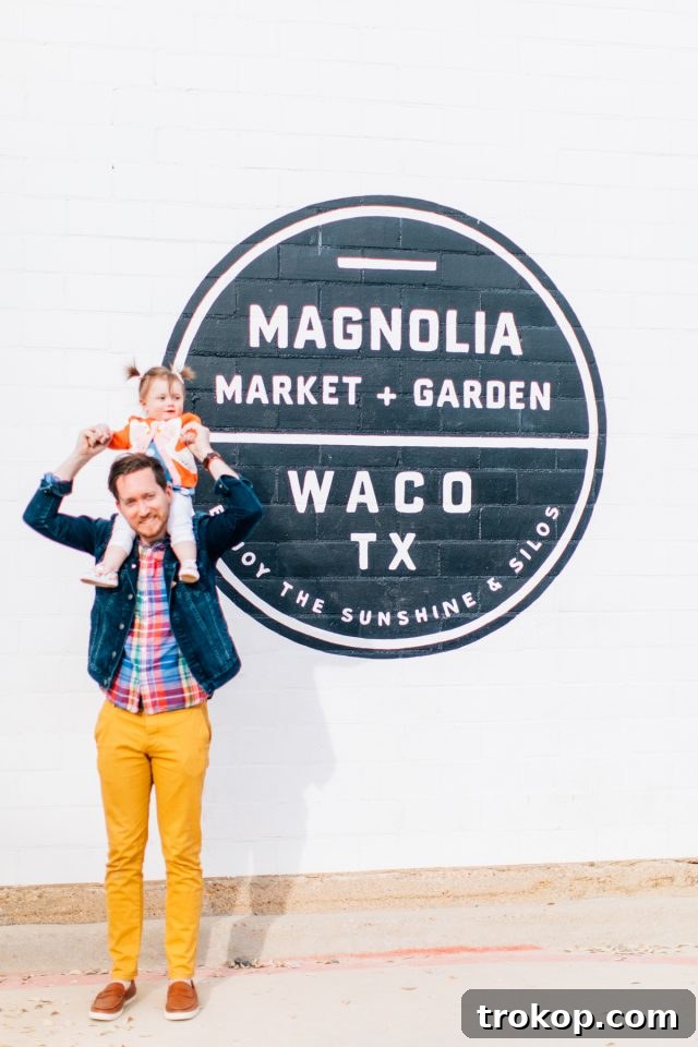Jared and Gwen pose happily at Magnolia Market in Waco, Texas