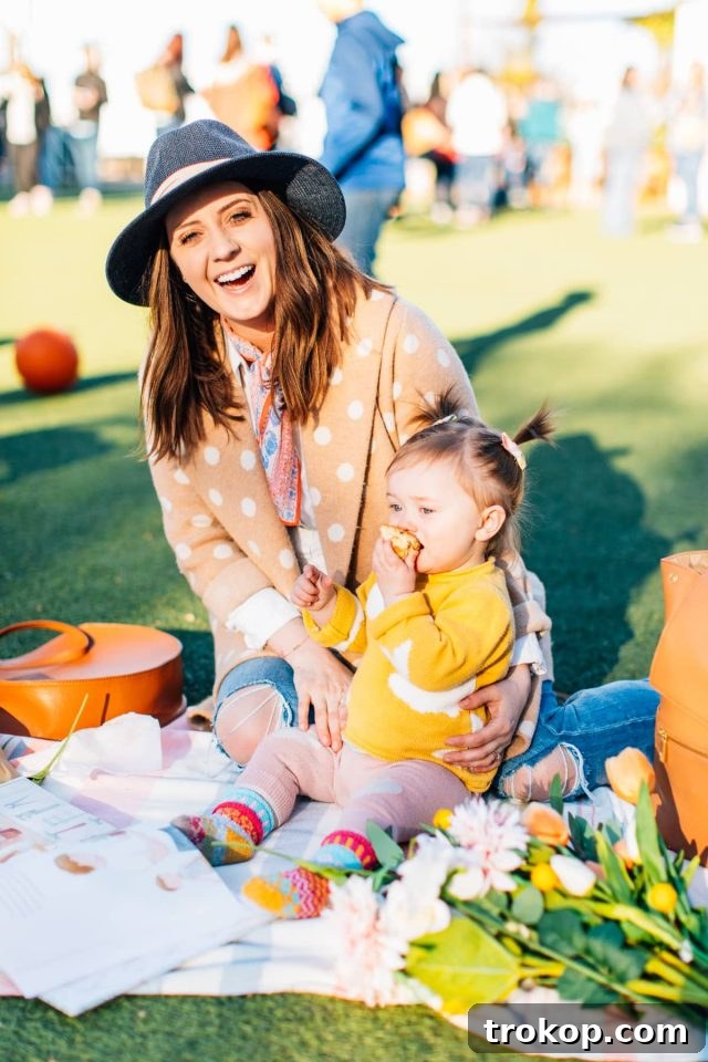 A child enjoys a delicious dessert from Silos Baking Co. on the lawn at Magnolia Market