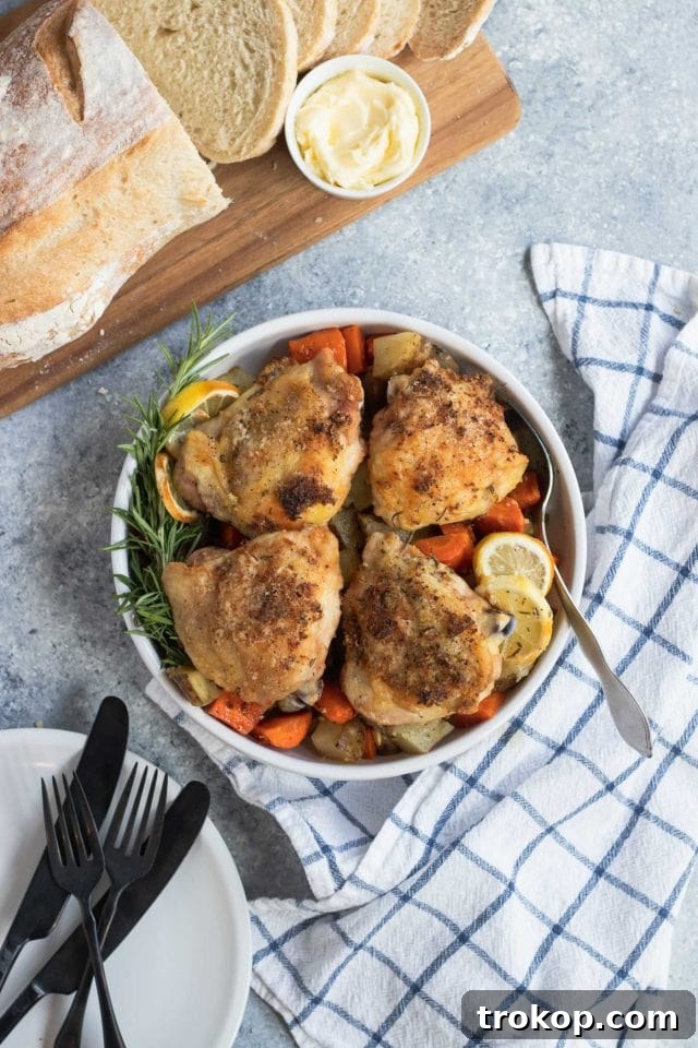Easy One Pan Lemon Rosemary Chicken 7 Overhead image of the vibrant Lemon Rosemary Chicken Sheet Pan Dinner recipe ready to be served