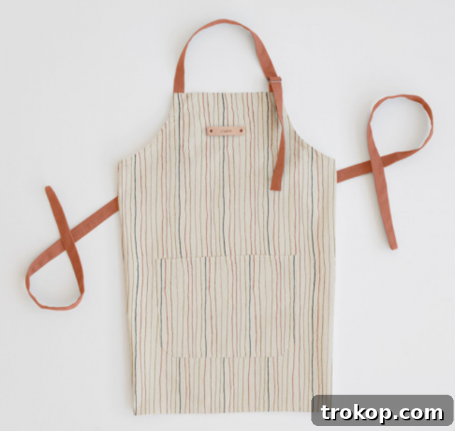 33 Heartfelt Gifts Your Best Friend Deserves 33 Striped apron with a personalized leather name tag, perfect for cooks