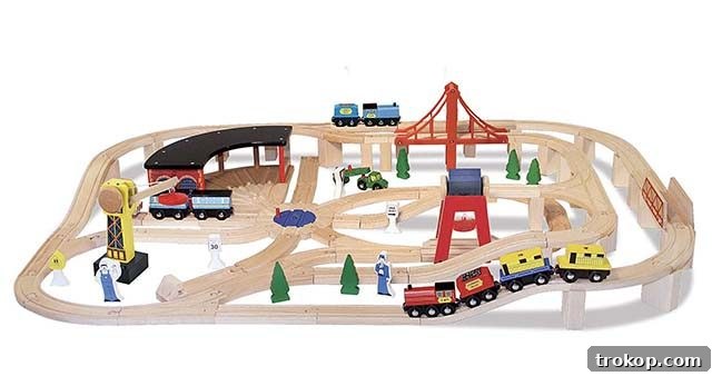 48 Irresistible Toys That Kids Will Love 12 Kids wooden railway set with trains and tracks, a classic construction toy.
