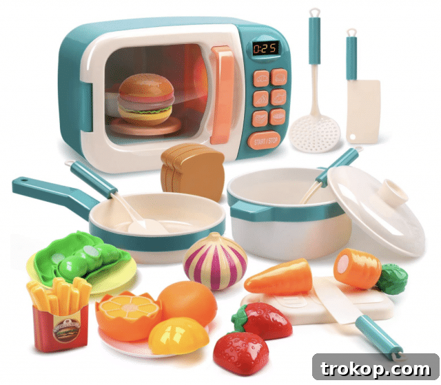 48 Irresistible Toys That Kids Will Love 13 Kids cooking play set with a pretend microwave, inspiring culinary creativity.