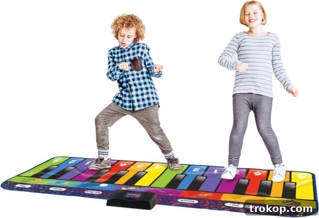 48 Irresistible Toys That Kids Will Love 32 6 ft. Floor Piano Mat for Kids & Toddlers, a giant musical toy for active play.