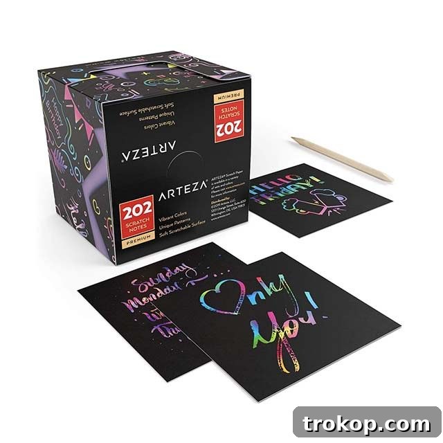 48 Irresistible Toys That Kids Will Love 40 Box of rainbow scratch paper notes, revealing colorful designs when scratched.