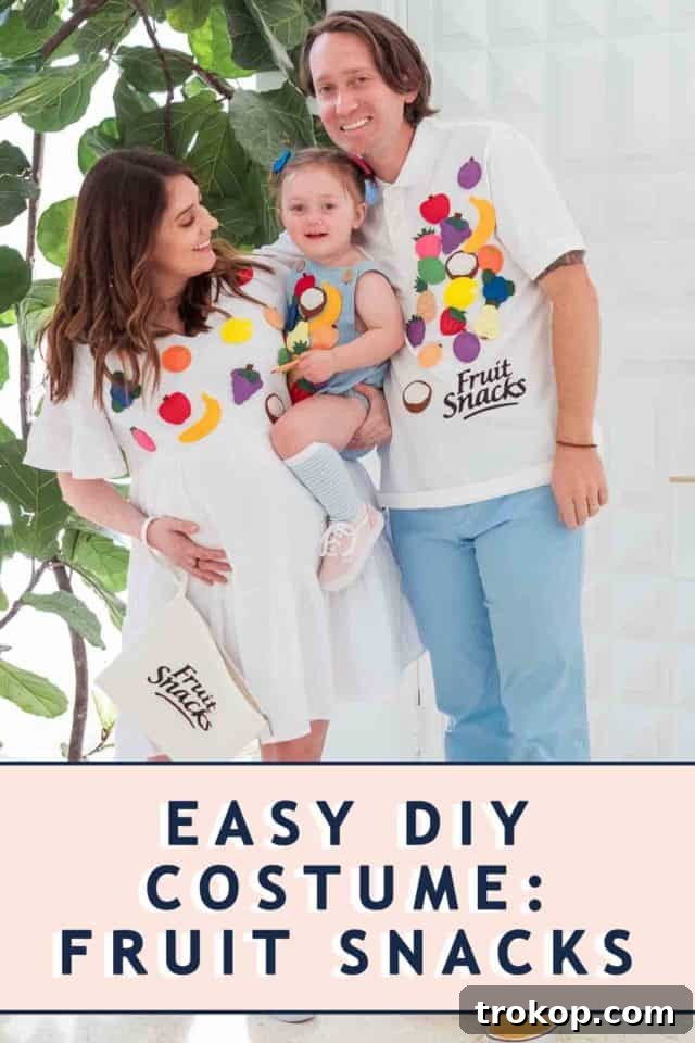 A complete family Halloween costume idea featuring everyone dressed as delightful fruit snacks, perfect for a fun and easy group look.