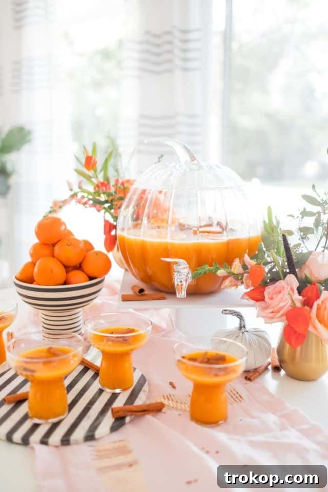 photo of thanksgiving cocktails and pumpkin punch bowl
