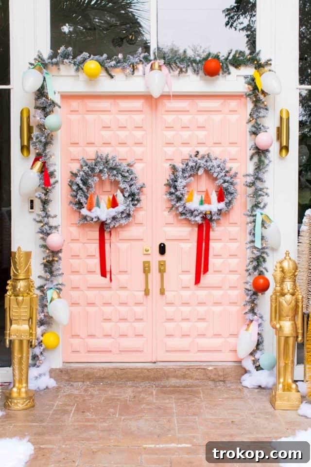 Vibrant Holiday Welcome: Christmas Doorway Designs 2 Double pink door with colorful Christmas decorations