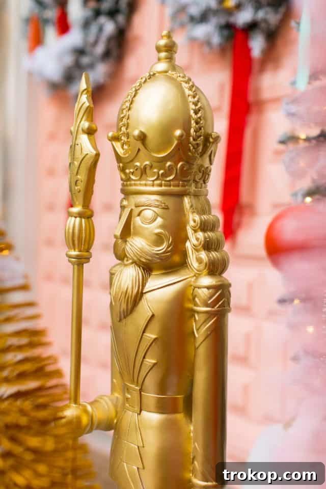 Vibrant Holiday Welcome: Christmas Doorway Designs 6 Gold nutcracker front door decoration