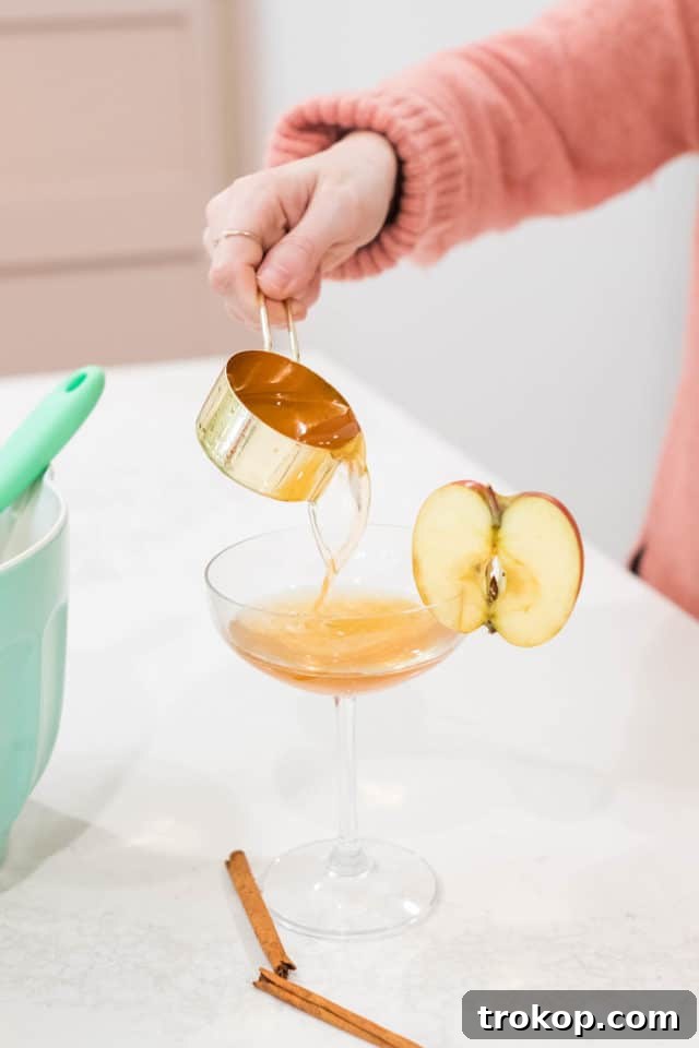 The apple cider vinegar drink, beautifully served warm, ready for a cozy occasion. Photo by top Houston lifestyle blogger Ashley Rose of Sugar & Cloth.
