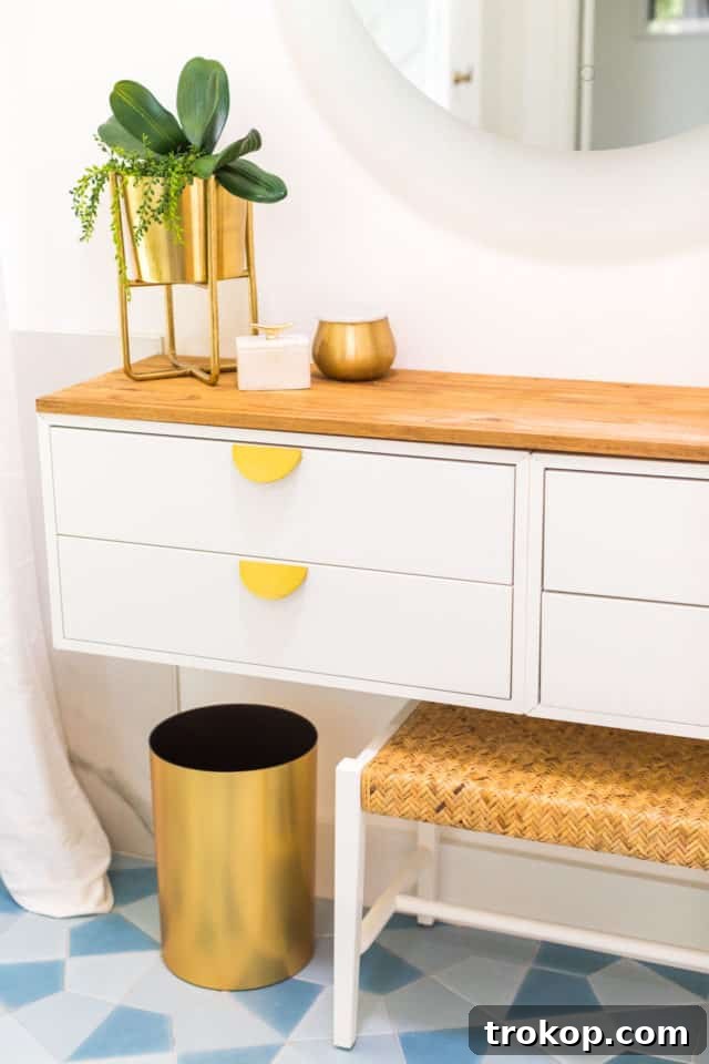 Organized drawers of a DIY vanity, featuring simple IKEA bathroom organizers for tidy storage of essentials.