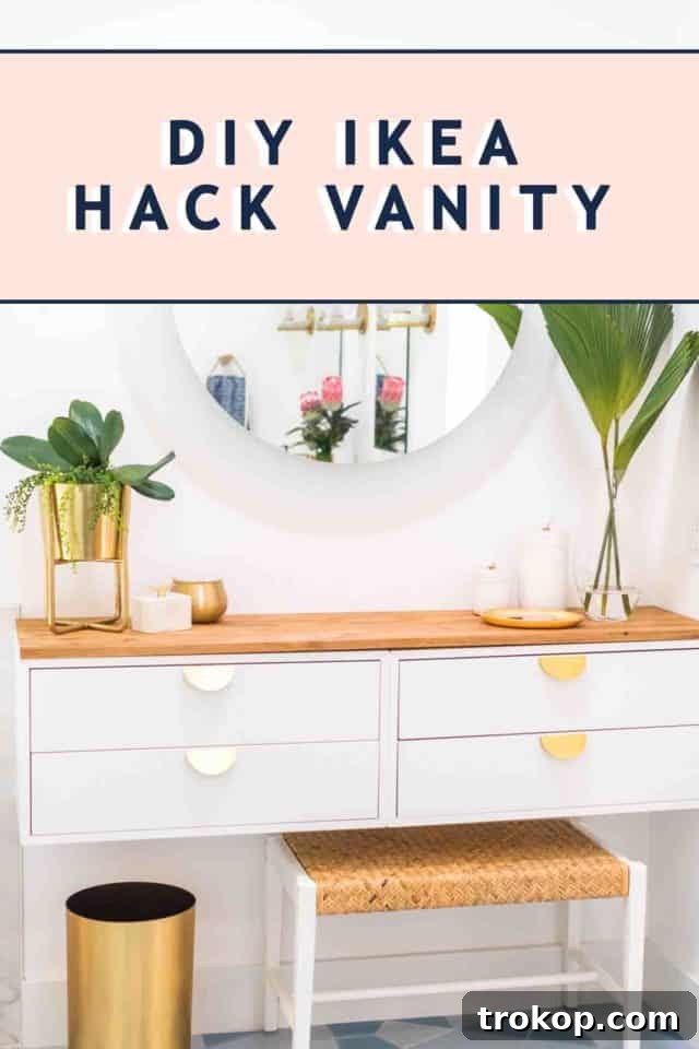 A wide shot of the elegant DIY IKEA vanity hack, showcasing its perfect integration into the master bathroom design.