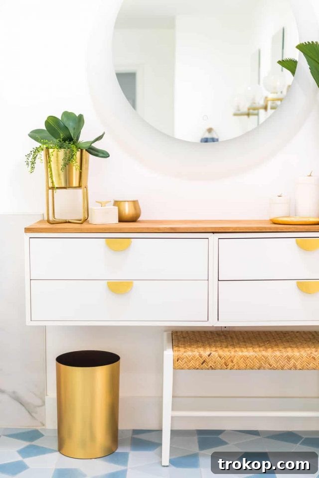Detailed shot of the custom half-moon drawer pulls on the IKEA Eket drawers, enhancing the vanity's chic design.