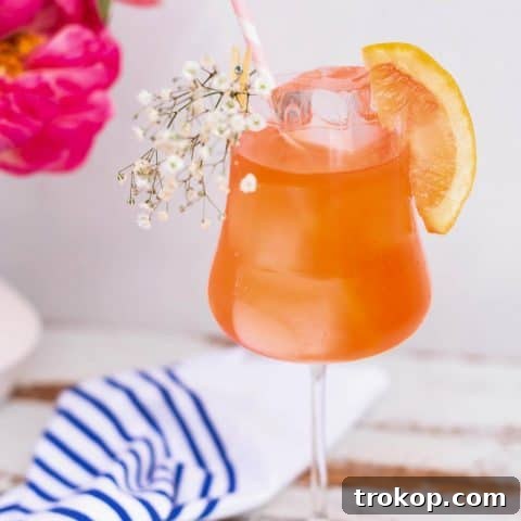 Elderflower Aperol Spritz cocktail garnished with baby breath